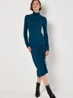 Foto van product Gebreide jurk Apricot petrol