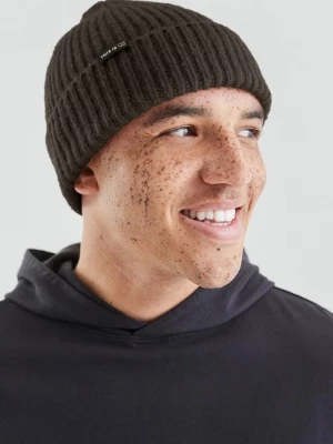 Foto van product Gebreide muts in grove breistructuur met logo QS bruin