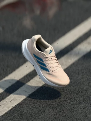 Foto van product Hardloopschoenen voor op de weg Adidas donkerroze