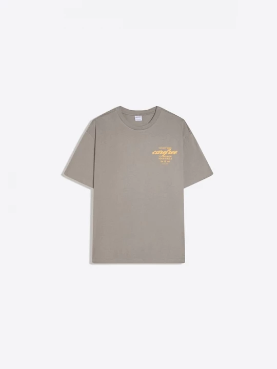 Foto van product Bershka Shirt 'PARADISE CLUB' rookgrijs / pasteloranje