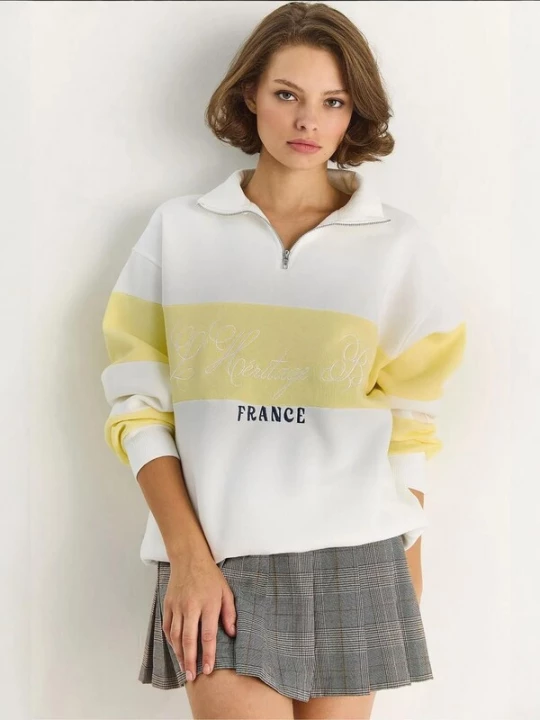 Foto van product Bianco Lucci Sweatshirt lichtgeel / zwart / wit