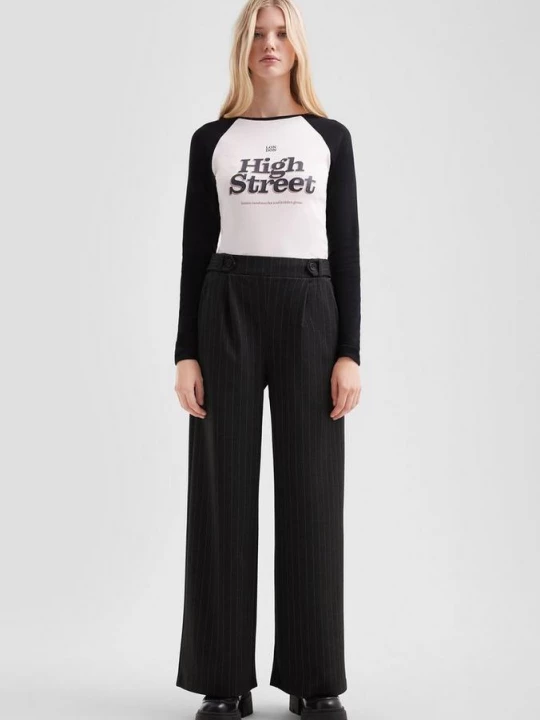Foto van product Broek met wijde pijpen in interlock jersey QS zwart
