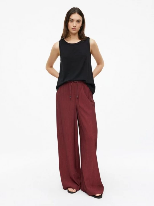 Foto van product Crepe broek met wijde pijpen en steekzakken s.Oliver rood