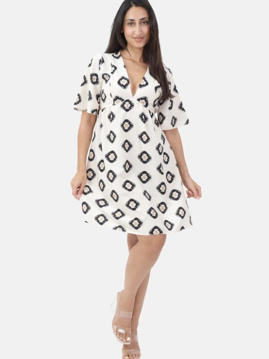 Foto van product Elara Jurk beige / ecru / zwart