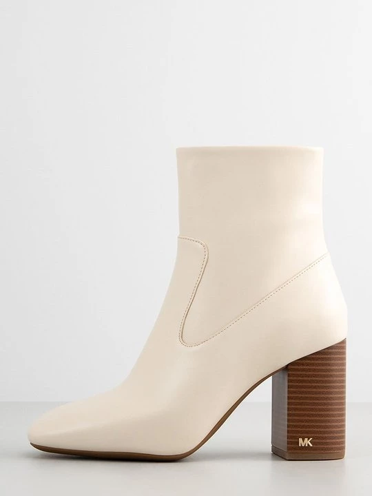 Foto van product Enkellaarsjes met hoge hak Michael Kors crème