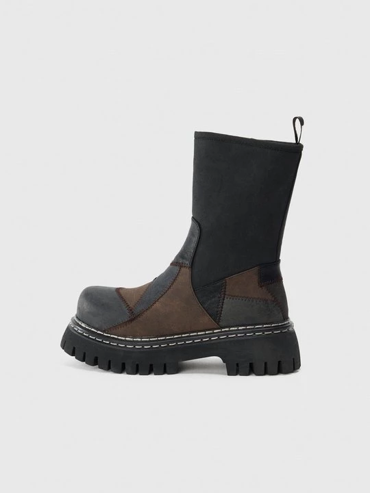 Foto van product Enkellaarsjes met plateauzool Koi Footwear zwart