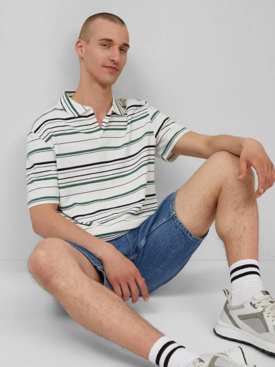 Foto van product Gestreepte polo van zware jersey QS crème