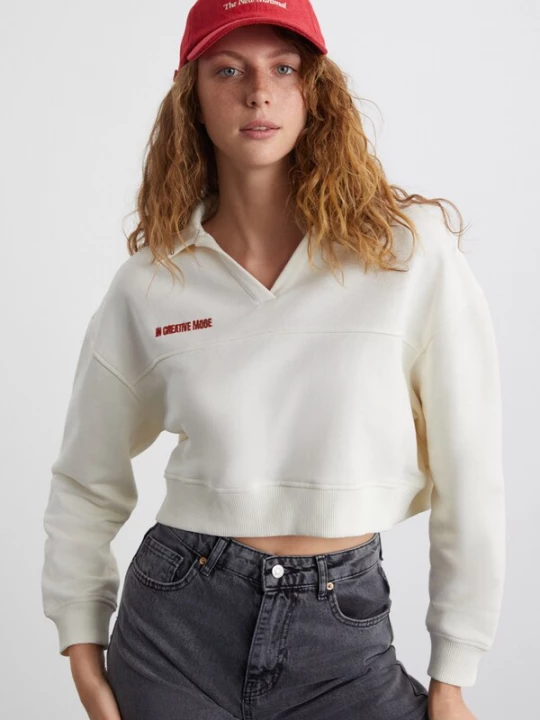 Foto van product Grimelange Sweatshirt ecru / rood