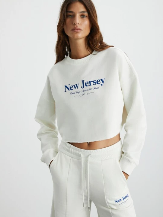 Foto van product Grimelange Sweatshirt lichtbeige / blauw