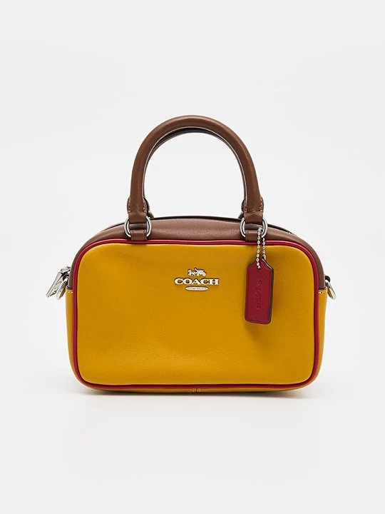 Foto van product Handtas Coach geel