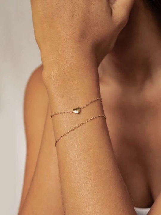 Foto van product Hey Happiness Armband 'Herzensband' goud