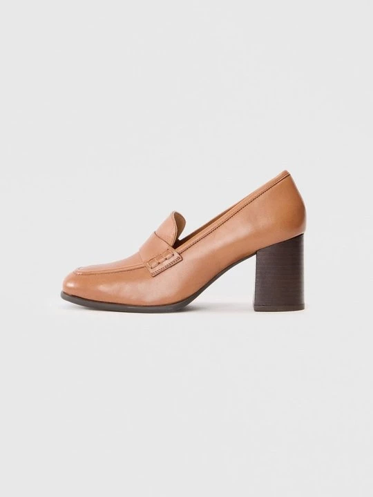 Foto van product Klassieke pumps Unisa oranje