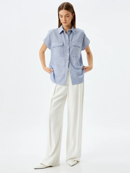 Foto van product Koton Blouse hemelsblauw / wit