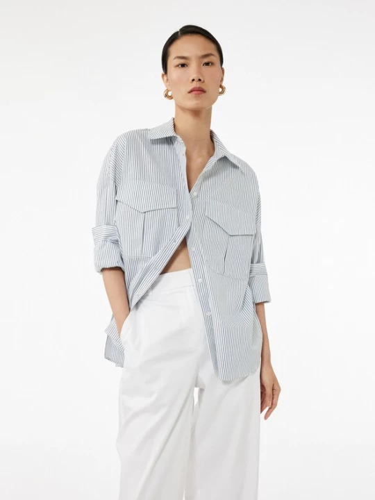 Foto van product Koton Blouse lichtblauw / wit