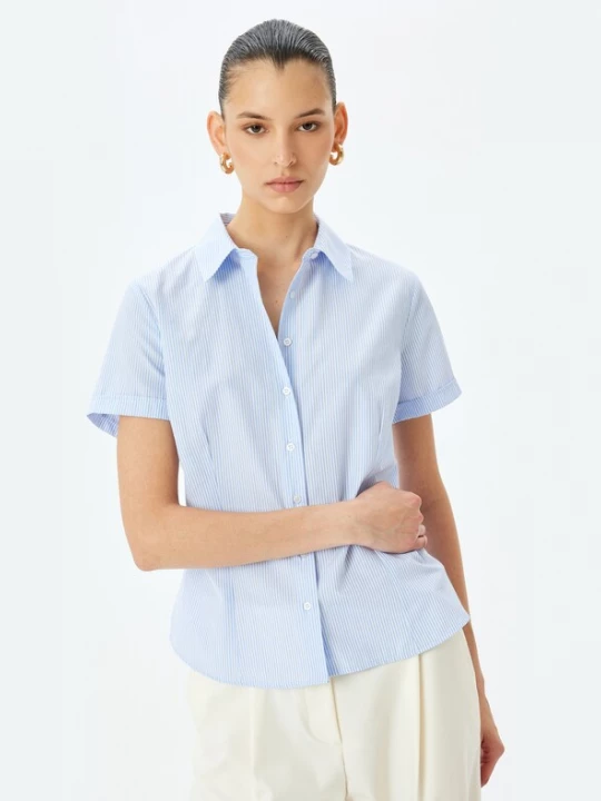 Foto van product Koton Blouse lichtblauw / wit