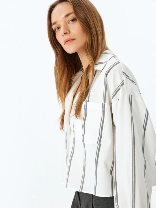 Foto van product Koton Blouse zwart / offwhite