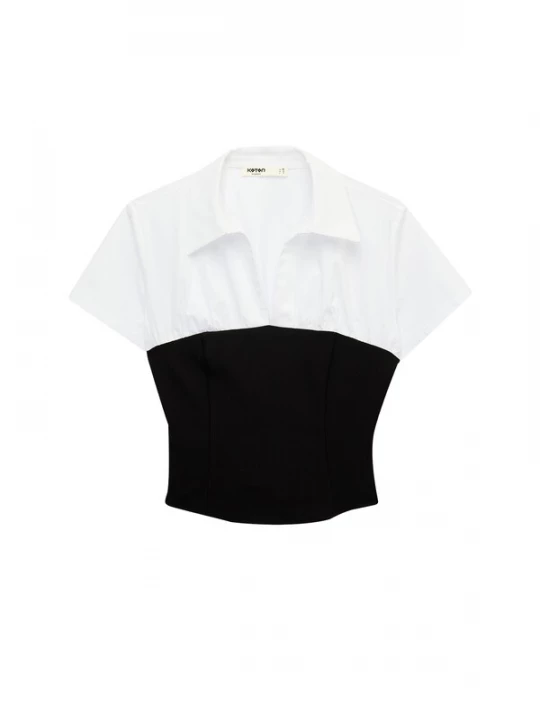 Foto van product Koton Blouse zwart / wit