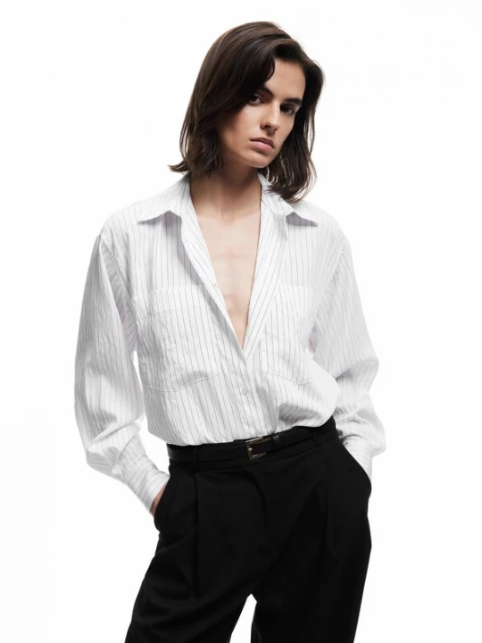 Foto van product Koton Blouse zwart / wit