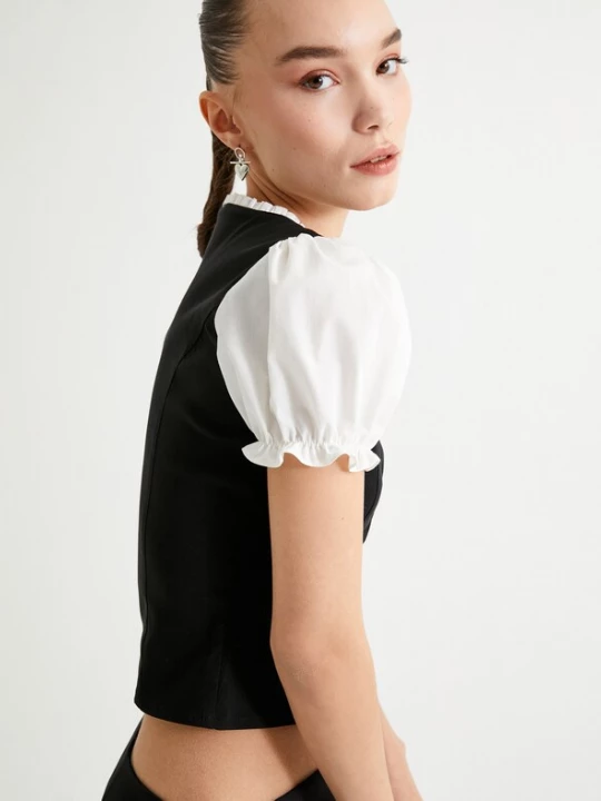 Foto van product Koton Blouse zwart / wit