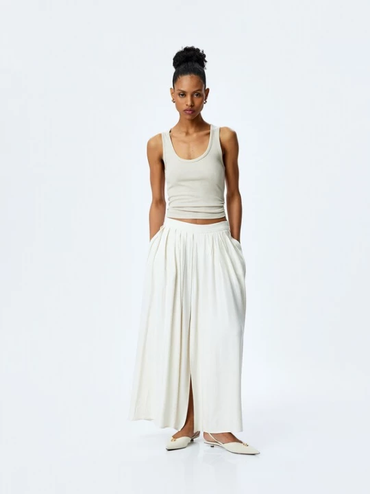 Foto van product Koton Rok beige / goud