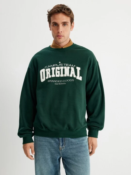 Foto van product Koton Sweatshirt donkergroen / wit