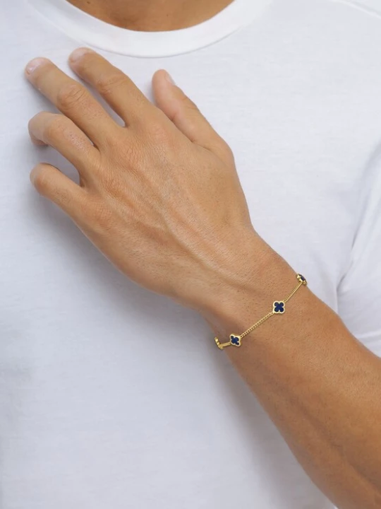 Foto van product KUZZOI Armband 'Kleeblatt' goud / zwart