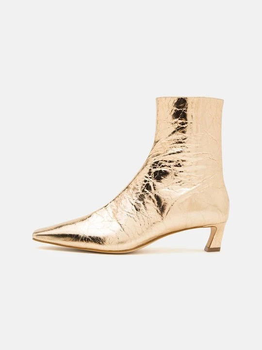 Foto van product Lage laarzen Michael Kors goudkleurig