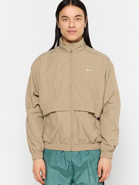 Foto van product Lichte jas Nike beżowy