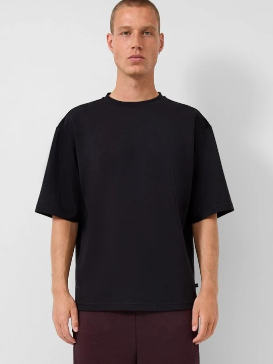 Foto van product Los T-shirt met geborduurd logo QS zwart