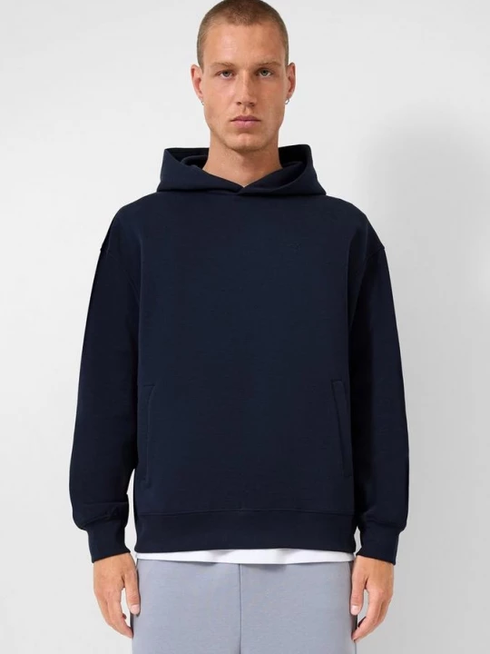 Foto van product Losvallende hoodie met geborduurd logo QS blauw