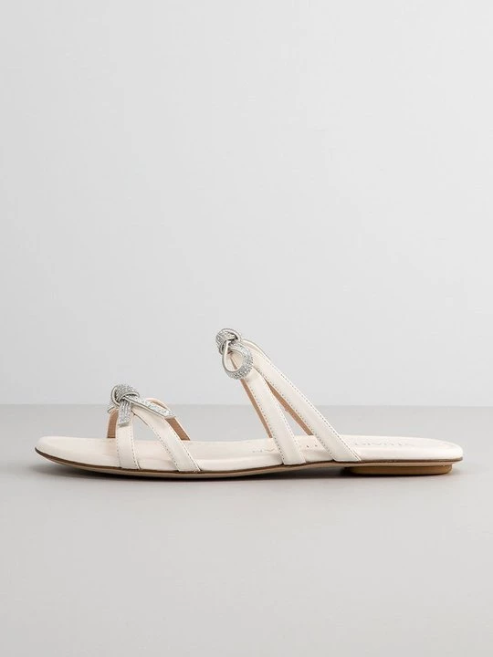 Foto van product Muiltjes Stuart Weitzman crème