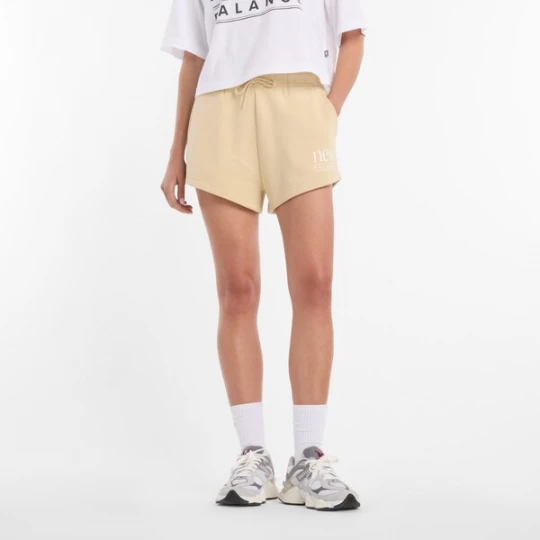 Foto van product new balance Broek 'Reimagined' lichtgeel / wit