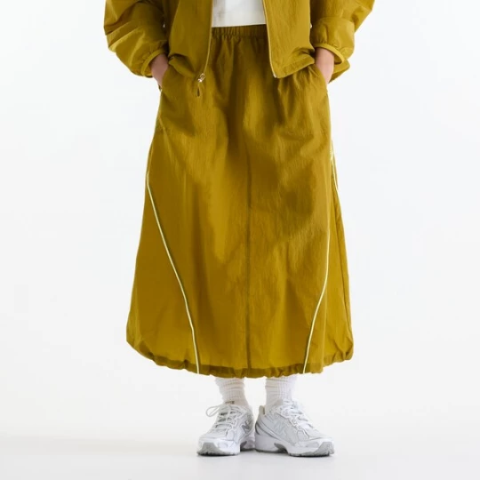 Foto van product new balance Rok 'Sport Legacy Skirt' geel