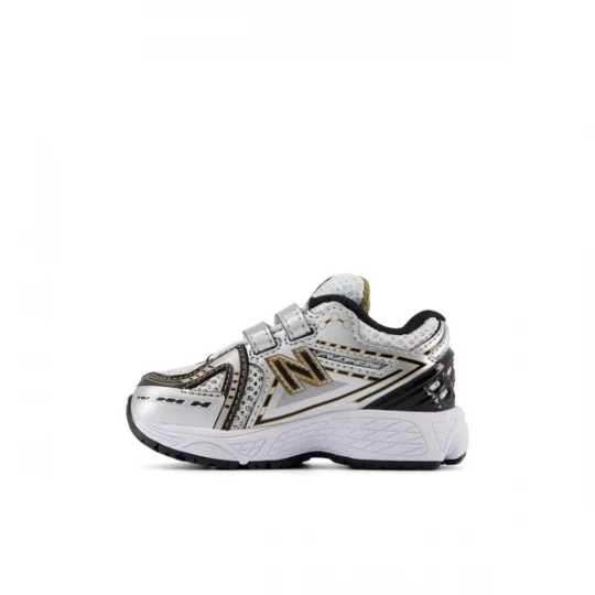 Foto van product new balance Sneakers '1906' goud / zwart / wit