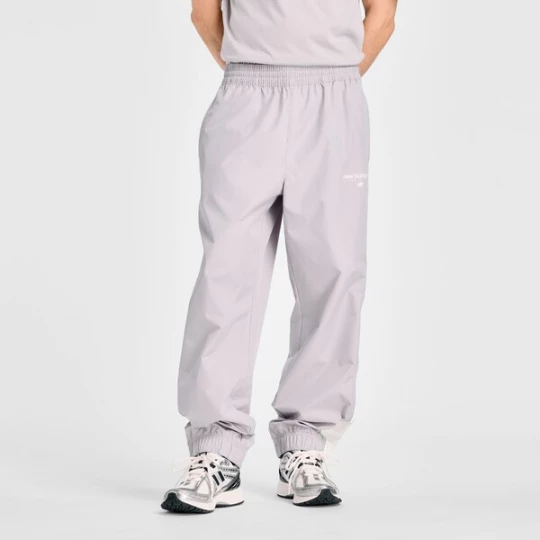 Foto van product new balance Sportbroek 'Trackside Woven Pant' grijs / lichtgrijs