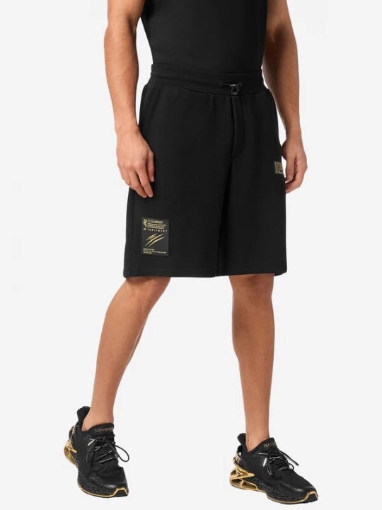Foto van product Plein Sport Sportbroek goud / zwart