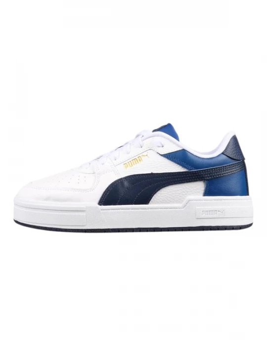 Foto van product PUMA Sneakers laag navy / donkerblauw / goud / wit