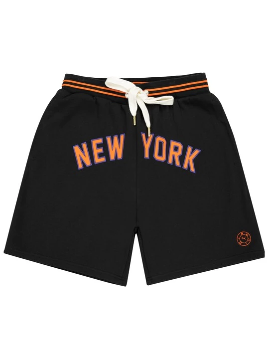 Foto van product PUMA Sportbroek oranje / zwart