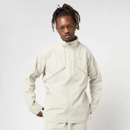 Foto van product Reflective Woven Jacket New Balance beżowy