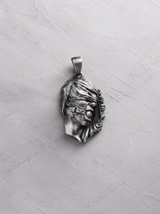 Foto van product REYTEL Hangers 'SUBMISSIVE' zilver