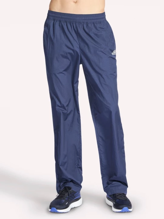 Foto van product Skechers GO SHIELD Track broek CM Houtskool / Marine, Maat Small