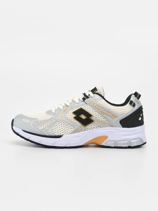 Foto van product Sneakers laag Lotto goudkleurig