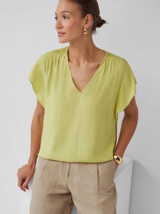 Foto van product Soepele viscose blouse met gesmokt effect en volantmouwen s.Oliver groen