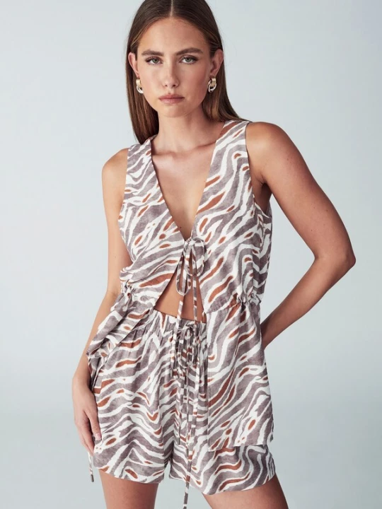 Foto van product St MRLO Broek 'Levie' nude / lichtbruin / wit