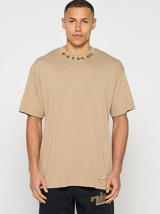 Foto van product T-shirt print Nike beżowy