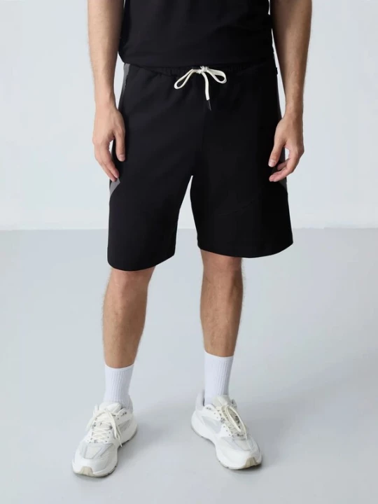 Foto van product Tommy Life Broek zwart / wit