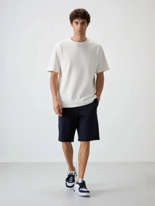 Foto van product Tommy Life Broek zwart / wit