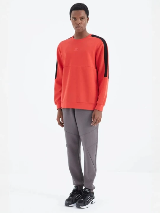 Foto van product Tommy Life Joggingpak antraciet / oranje / zwart