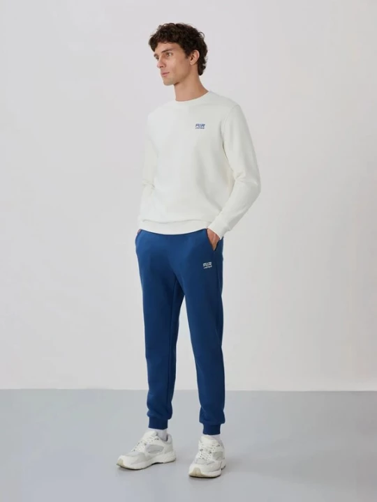 Foto van product Tommy Life Joggingpak blauw / wit