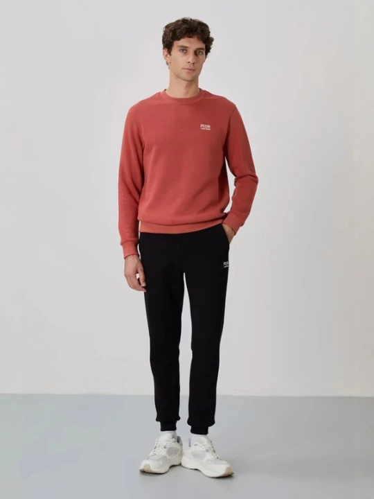 Foto van product Tommy Life Joggingpak cranberry / zwart